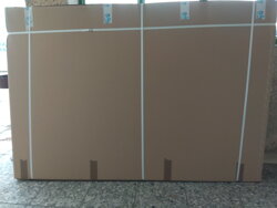 poskladaný bicykel v krabici